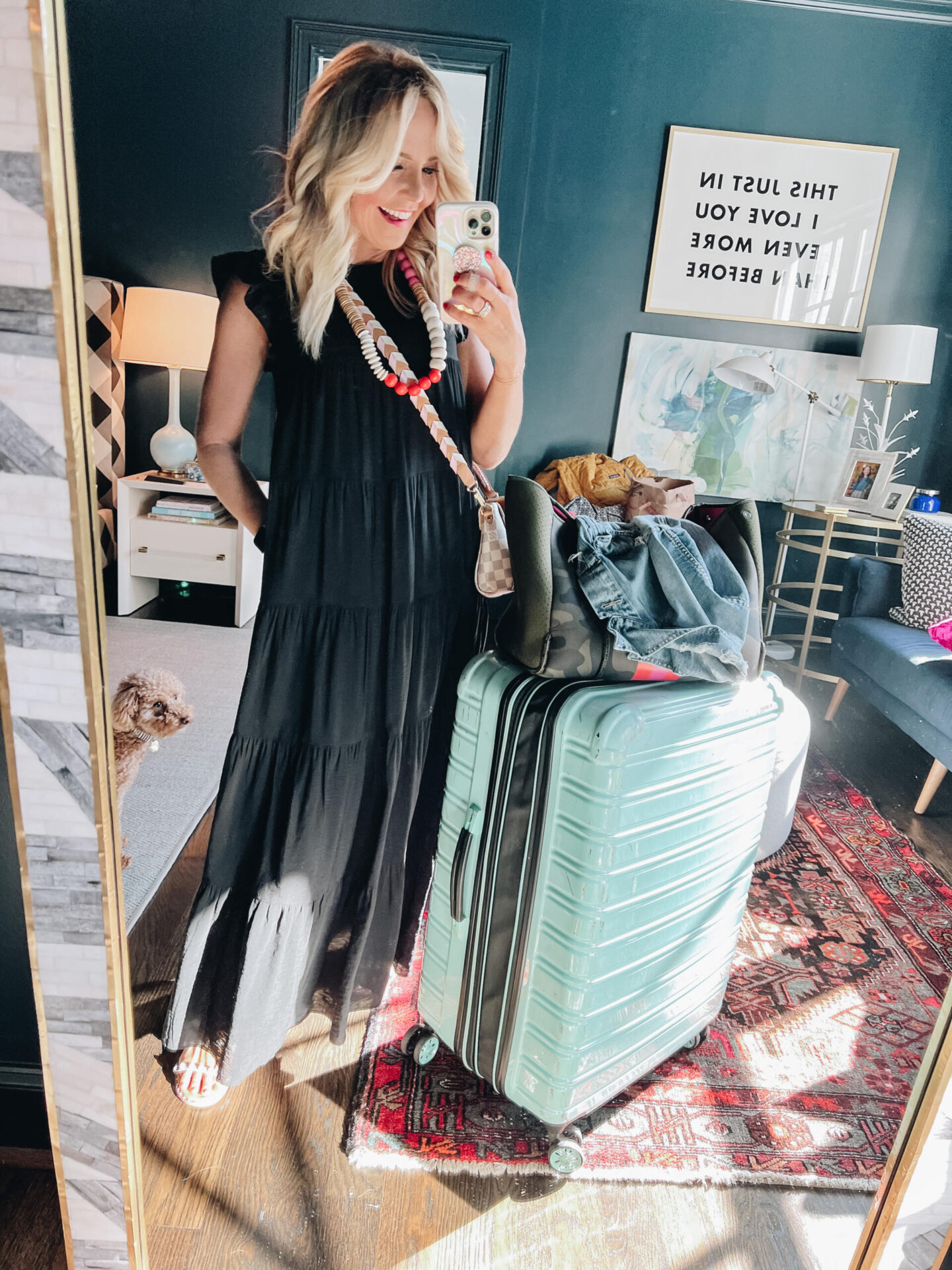 top 10 travel essentials for her featured by hello happiness.