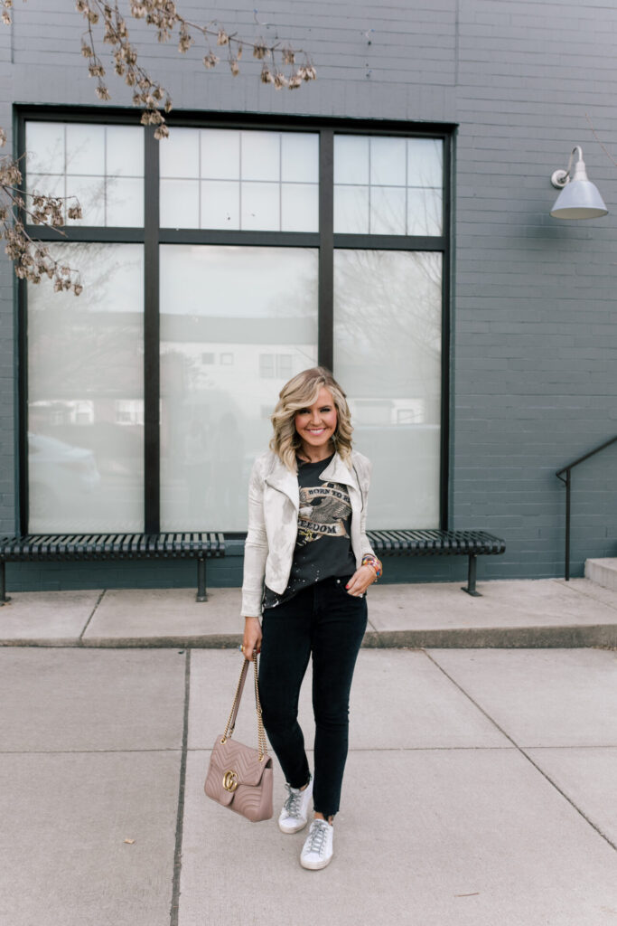 Independence Day Deals by popular Nashville life and style blog, Hello Happiness: image of Natasha Stoneking wearing a Evereve born to ride t-shirt, EvereveMarrakech Marci Moto Jacket, and Evereve  P448 Glitter Sneaker. 