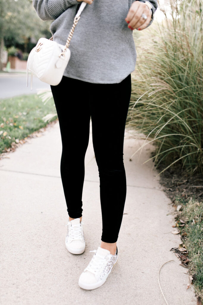Holiday Collection by popular Nashville fashion blog, Hello Happiness: image of Natasha Stoneking wearing a Gibson x Glam Mom in Style velvet legging with a grey sweater and sneakers. 