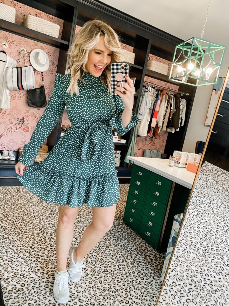 Top Amazon Products by popular Nashville life and style blog, Hello Happiness: image of a woman wearing a Amazon Floerns Women's Long Sleeve Ruffle Trim Self Tie Floral Print Short Dress.