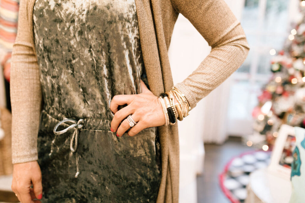 Holiday Collection by popular Nashville fashion blog, Hello Happiness: image of Natasha Stoneking wearing a Gibson x Glam crushed velvet sleeveless jumper and gold duster cardigan. 