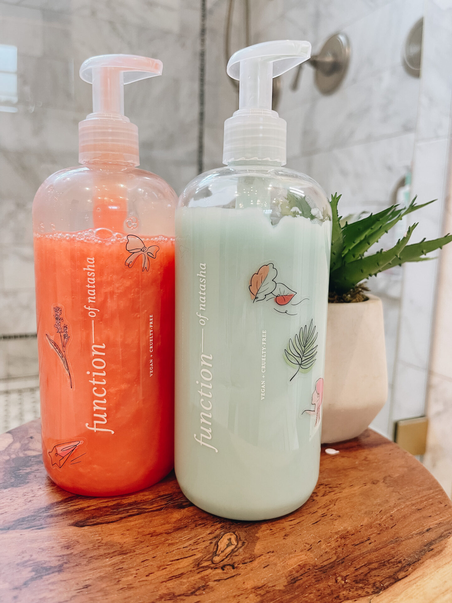 Hair Care Routine by popular Nashville beauty blog, Hello Happiness: image of Function shampoo and conditioner bottles. 