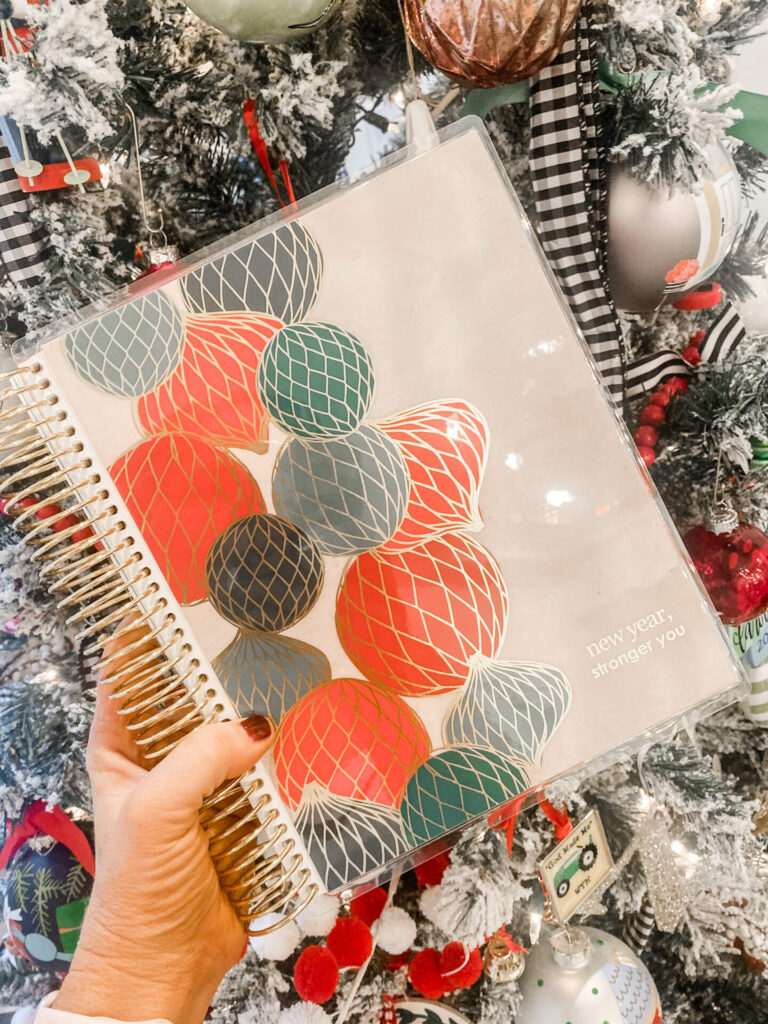 Cyber Monday Sale by popular Nashville life and style blog, Hello Happiness: image of Natasha Stoneking holding a Sam Edelman planner. 
