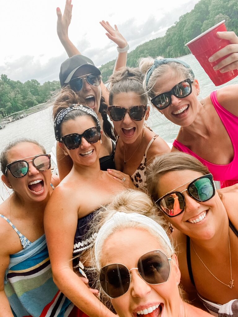Year in Review by popular Nashville lifestyle blog, Hello Happiness: image of a group of women standing together by a lake. 
