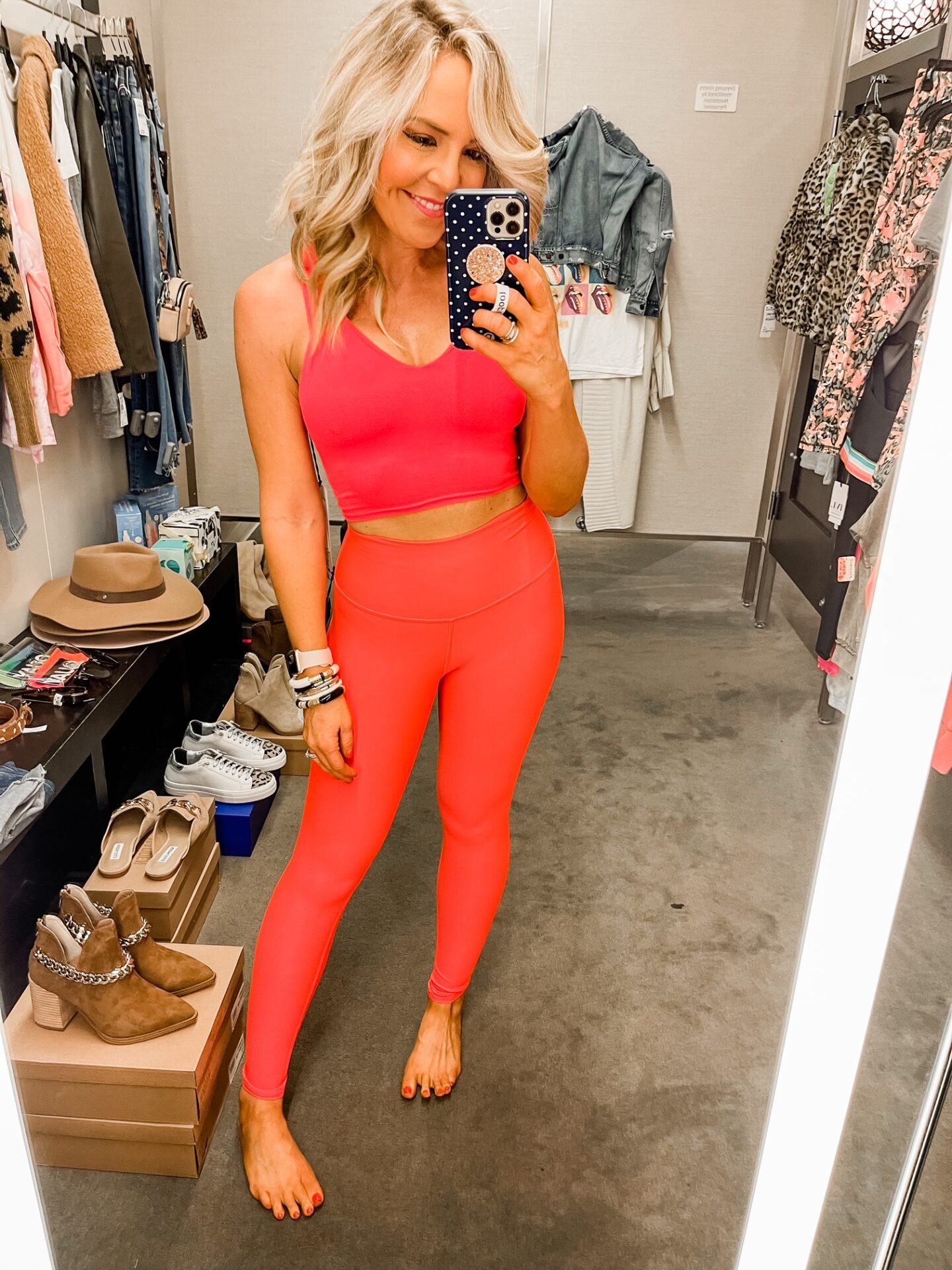 Nordstrom Anniversary Sale by popular Nashville fashion blog, Hello Happiness: image of Natasha Stoneking wearing a Nordstrom real sports bra and airlift leggings. 