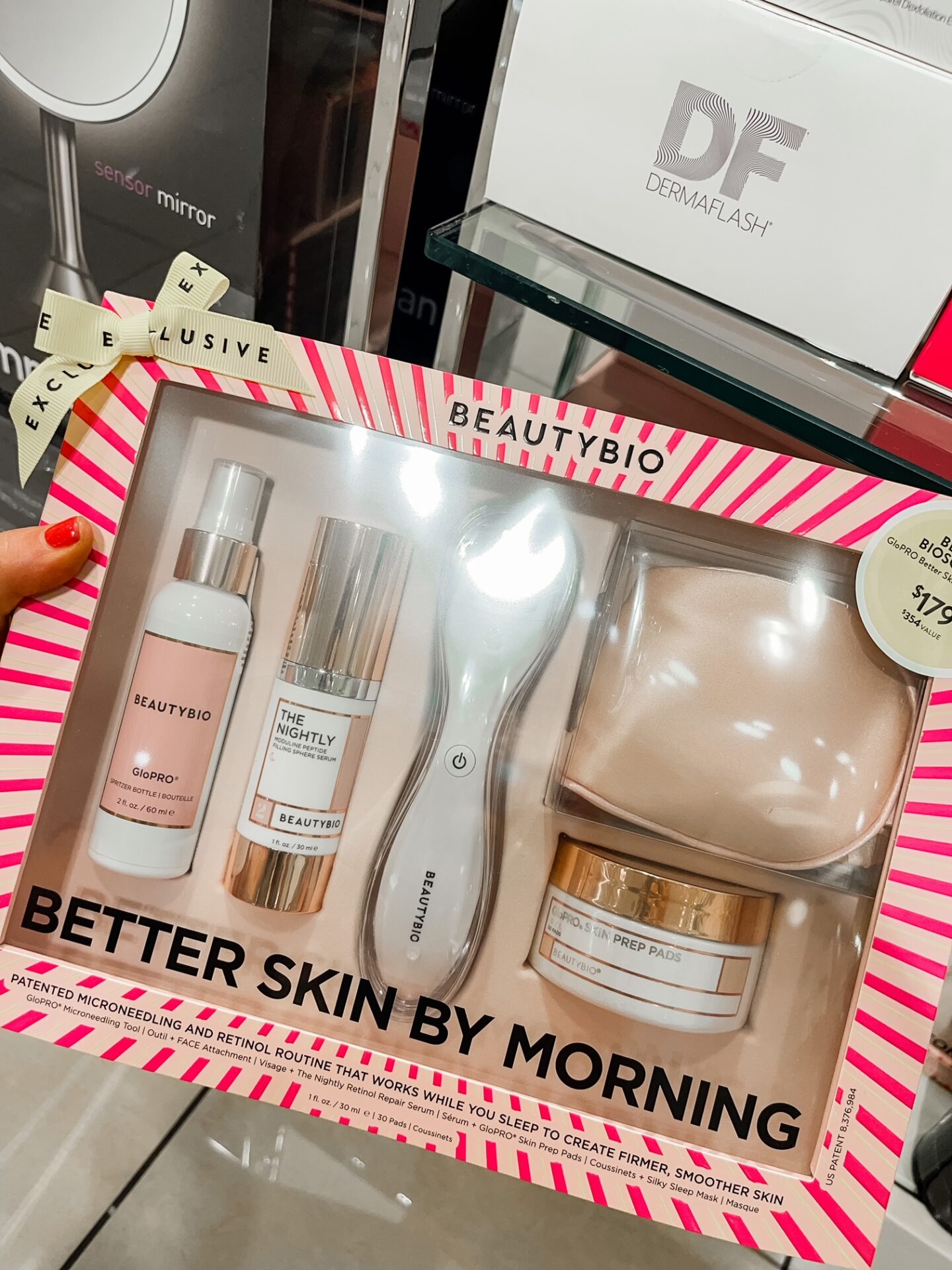 Nordstrom Anniversary Sale by popular Nashville fashion blog, Hello Happiness: image of Natasha Stoneking holding a Nordstrom Beauty Bio better skin by morning set. 