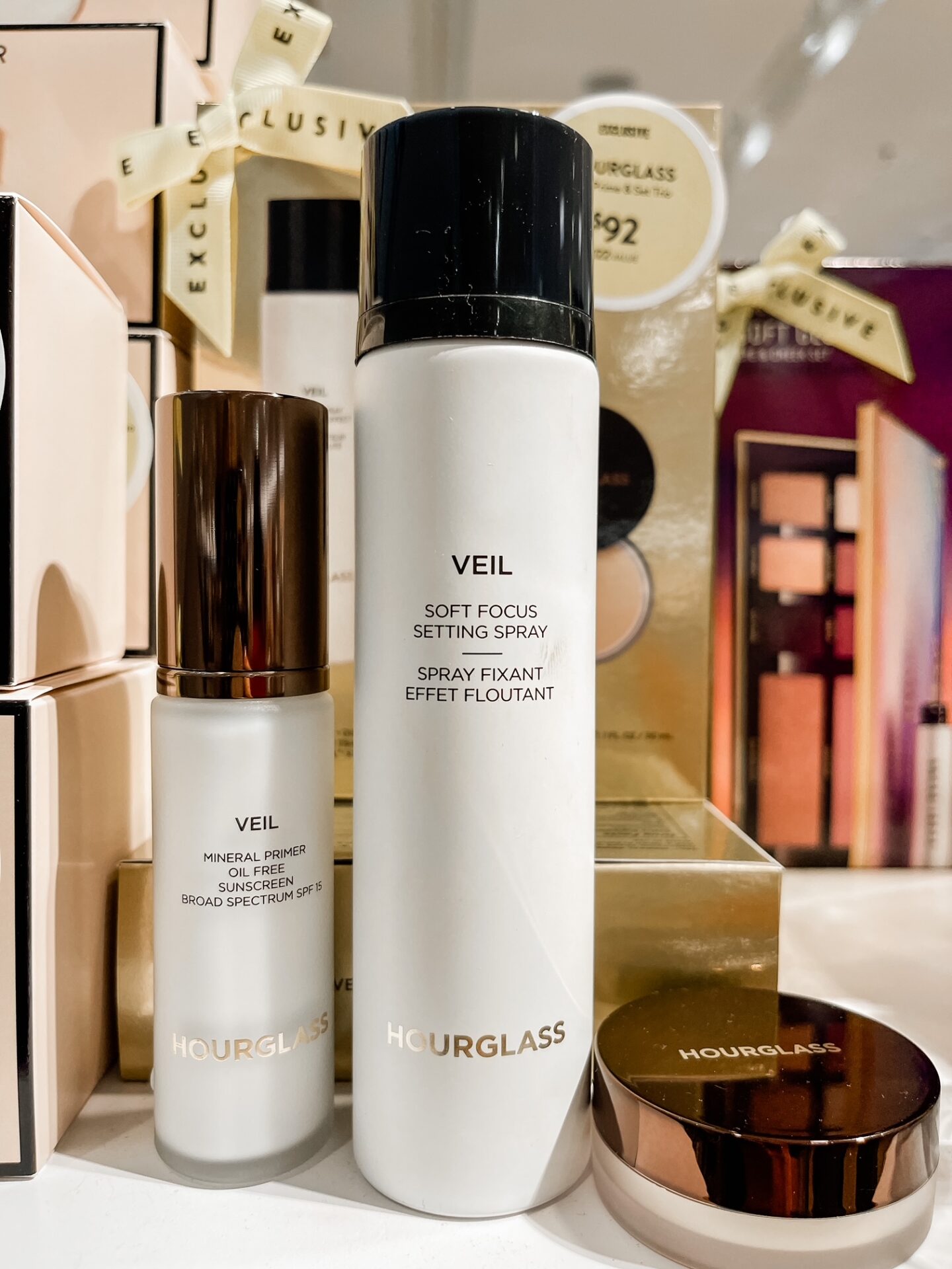 Nordstrom Anniversary Sale by popular Nashville fashion blog, Hello Happiness: image of Natasha Stoneking holding a Nordstrom Veil Hourglass skincare. 