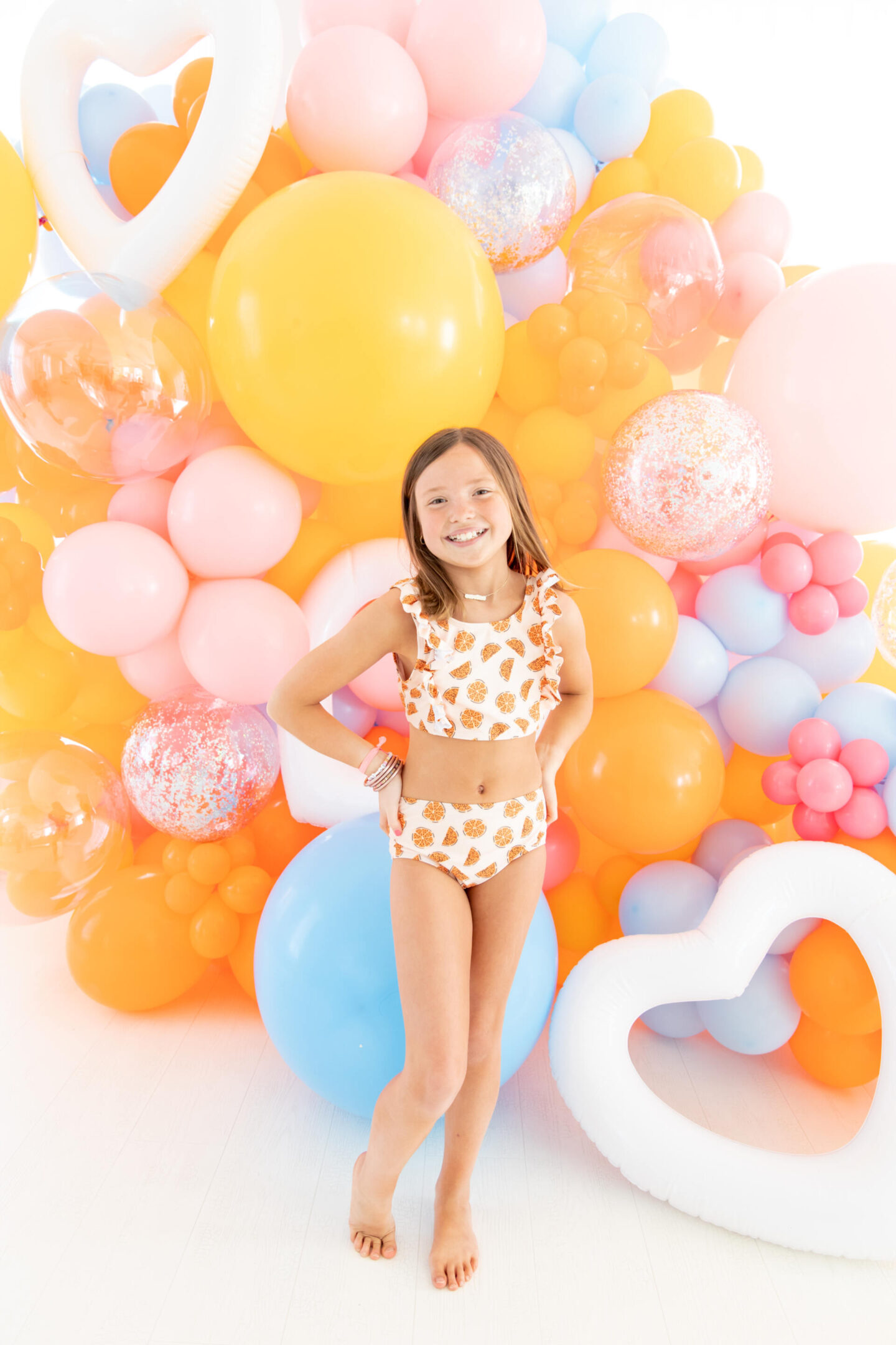 The Oaks Apparel x Hello Happiness  swimsuits collection