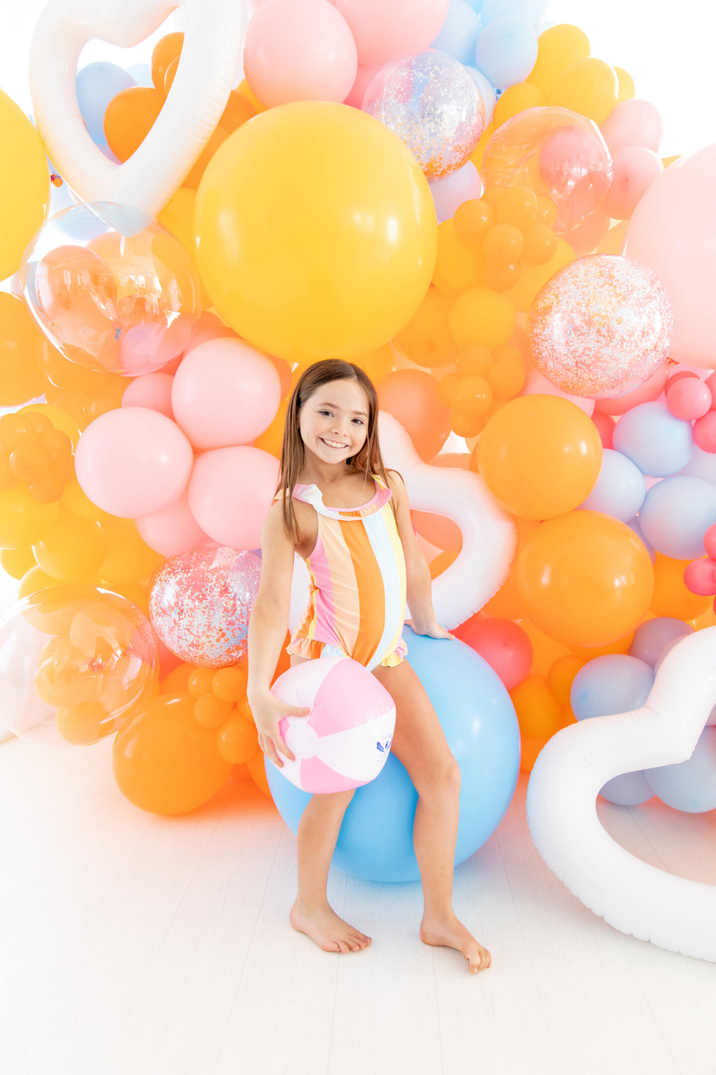 The Oaks Apparel x Hello Happiness  swimsuits collection