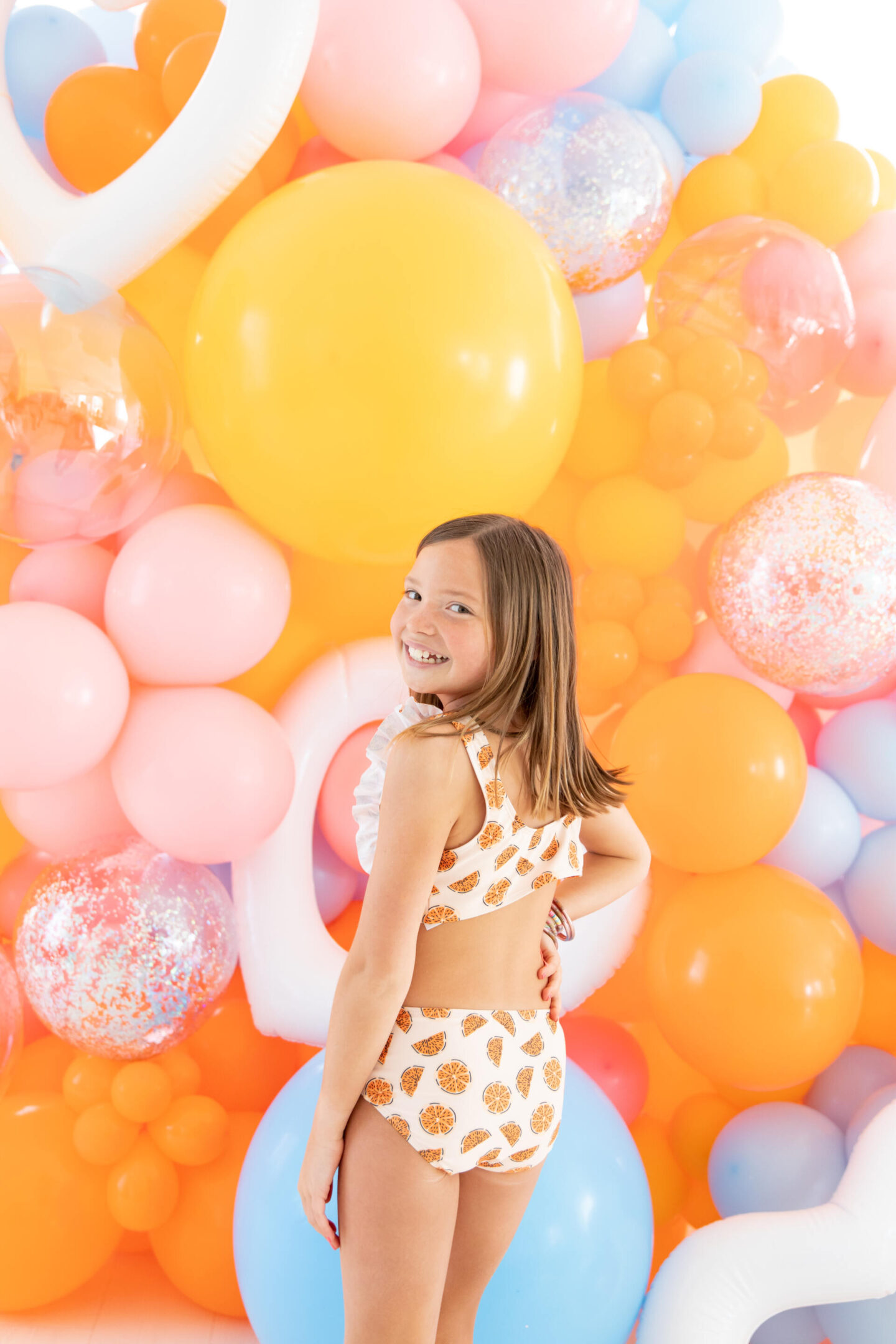 The Oaks Apparel x Hello Happiness  swimsuits collection