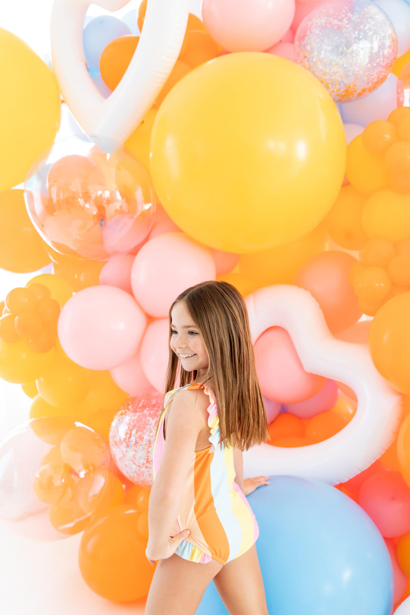 The Oaks Apparel x Hello Happiness  swimsuits collection