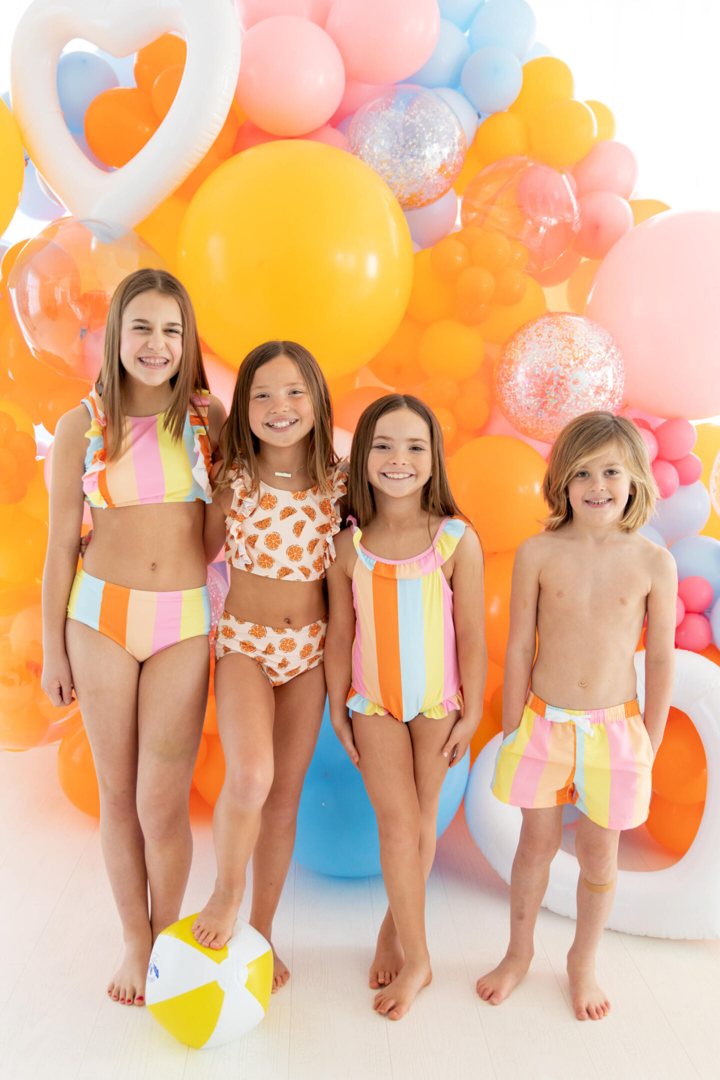 The Oaks Apparel x Hello Happiness  swimsuits collection