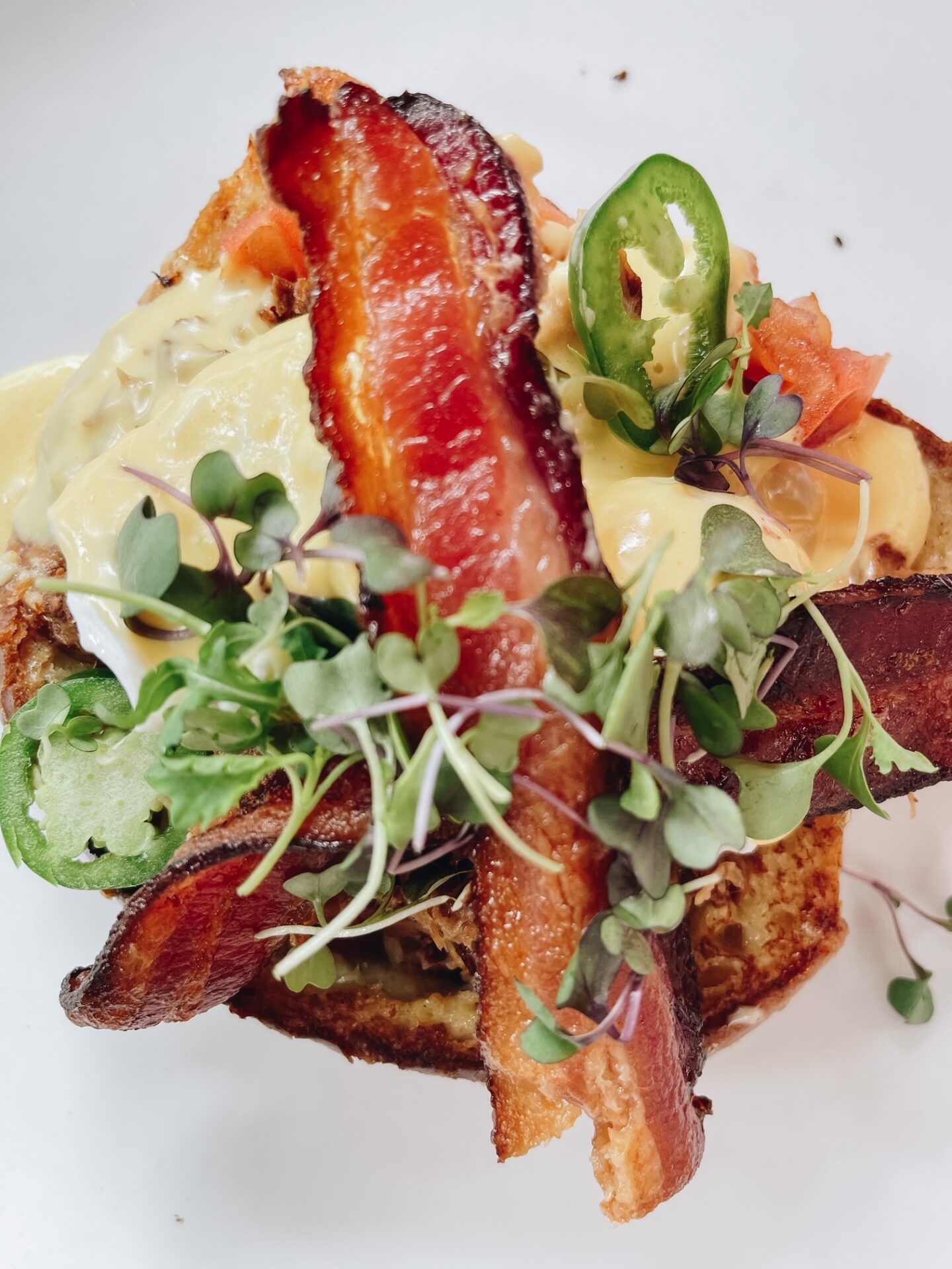 Girls Getaway by popular Nashville travel blog, Hello Happiness: image of a plate of eggs Benedict. 