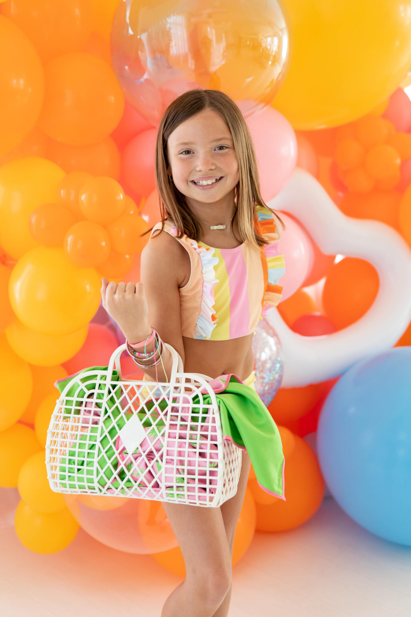 The Oaks Apparel x Hello Happiness  swimsuits collection