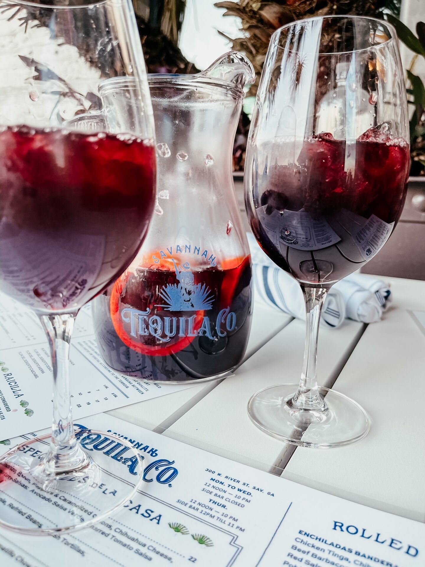 Girls Getaway by popular Nashville travel blog, Hello Happiness: image of Savannah Tequila Co decanter and wine glasses. 