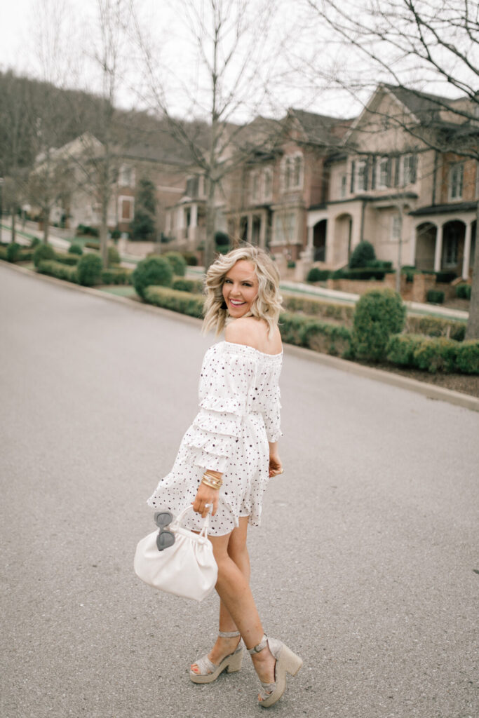 Vici Collection Polka Dot Dress by popular Nashville fashion blog, Hello Happiness: image of a woman wearing a Vici ENCHANTED OFF THE SHOULDER POLKA DOT DRESS, Vici NOE VALLEY PYTHON PLATFORM ESPADRILLE SANDAL, and Vici MOSCOW EMBOSSED CROSSBODY POUCH BAG.