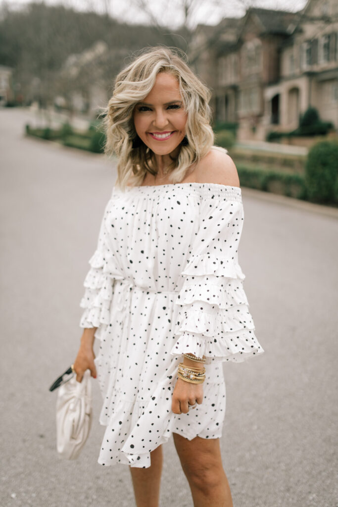 Vici Collection Polka Dot Dress by popular Nashville fashion blog, Hello Happiness: image of a woman wearing a Vici ENCHANTED OFF THE SHOULDER POLKA DOT DRESS, Vici NOE VALLEY PYTHON PLATFORM ESPADRILLE SANDAL, and Vici MOSCOW EMBOSSED CROSSBODY POUCH BAG.