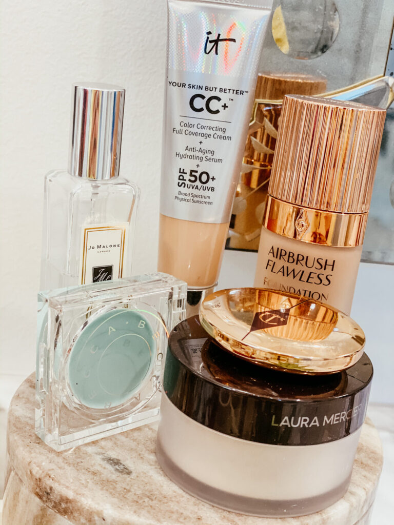 Sephora Spring Sale by popular Nashville beauty blog, Hello Happiness: image of IT cosmetics CC cream, Jo Malone perfume, Charlotte Tilbury Airbrush Flawless foundation, Laura Mercer translucent setting powder, and Becca Undereye primer. 