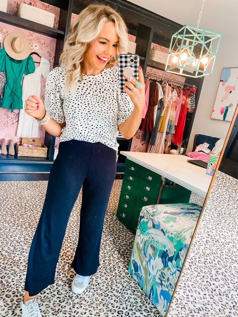 Amazon Favorites by popular Nashville life and style blog, Hello Happiness: image of a woman wearing a Amazon Daily Ritual puff sleeve top. 