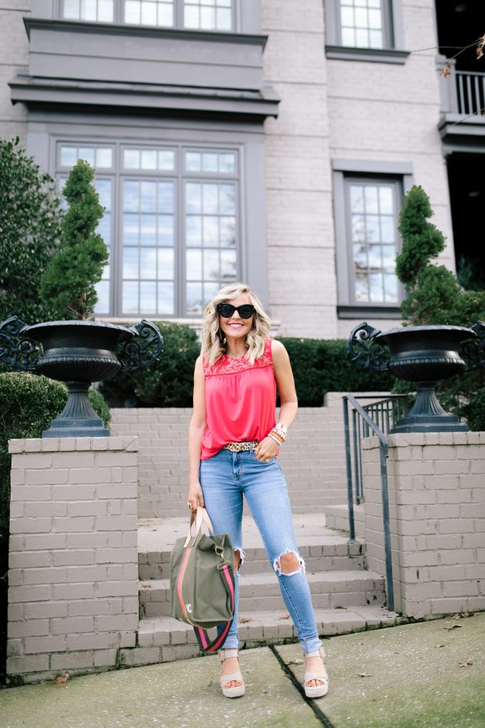 Let's Getaway... The Gibson Resort x Hi Sugarplum Collection is Here! by popular Nashville fashion blog, Hello Happiness: image of a woman wearing a Hi Sugarplum Limone Floral Yoke Sleeveless Top, ShopBop Levi's 721 High Rise Distressed Skinny Jeans, Bagging Rights Toteally Bag, Zappos SOLE / SOCIETY Audrina, Amazon SANSTHS Womens Leopard Belt SANSTHS Ladies Leopard Print Leather Waist Belt, Amazon Freckles Butterfly Sunglasses Semi Cat Eye Glasses Plastic Frame Clear Gradient Lenses, and The Accessory Scout earrings. 