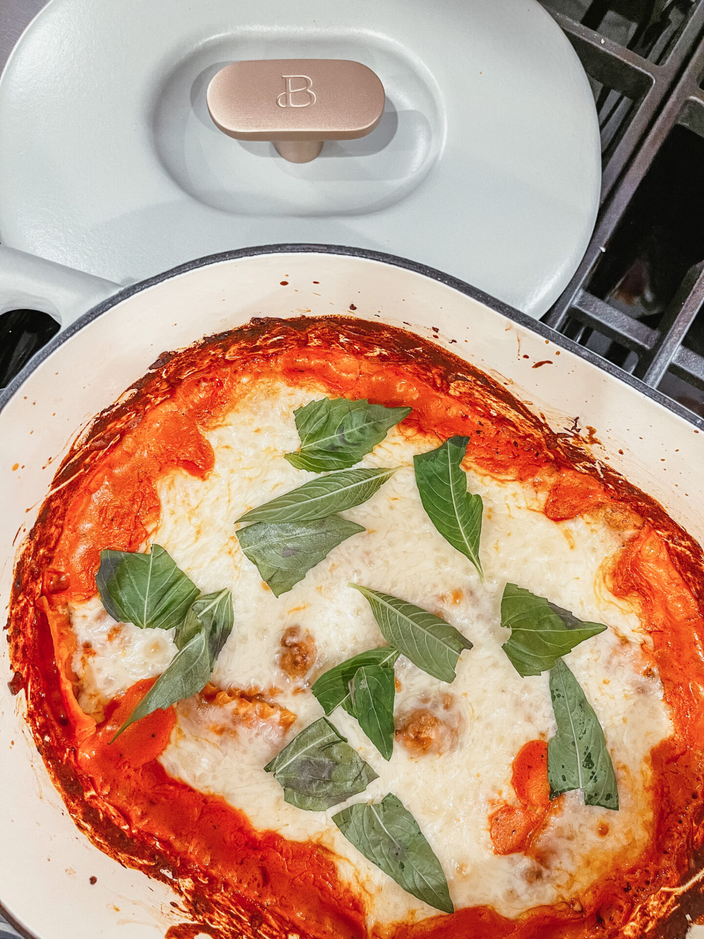 Beautiful by Drew Barrymore by popular Nashville life and style blog, Hello Happiness: image of an Italian dish in pan from the Beautiful by Drew Barrymore collection. 