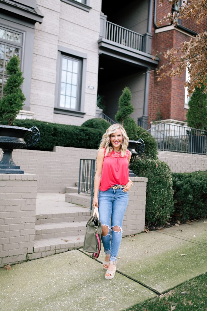 Let's Getaway... The Gibson Resort x Hi Sugarplum Collection is Here! by popular Nashville fashion blog, Hello Happiness: image of a woman wearing a Hi Sugarplum  Limone Floral Yoke Sleeveless Top, ShopBop Levi's 721 High Rise Distressed Skinny Jeans, Bagging Rights Toteally Bag, Zappos SOLE / SOCIETY Audrina, Amazon SANSTHS Womens Leopard Belt SANSTHS Ladies Leopard Print Leather Waist Belt, Amazon Freckles Butterfly Sunglasses Semi Cat Eye Glasses Plastic Frame Clear Gradient Lenses, and The Accessory Scout earrings. 