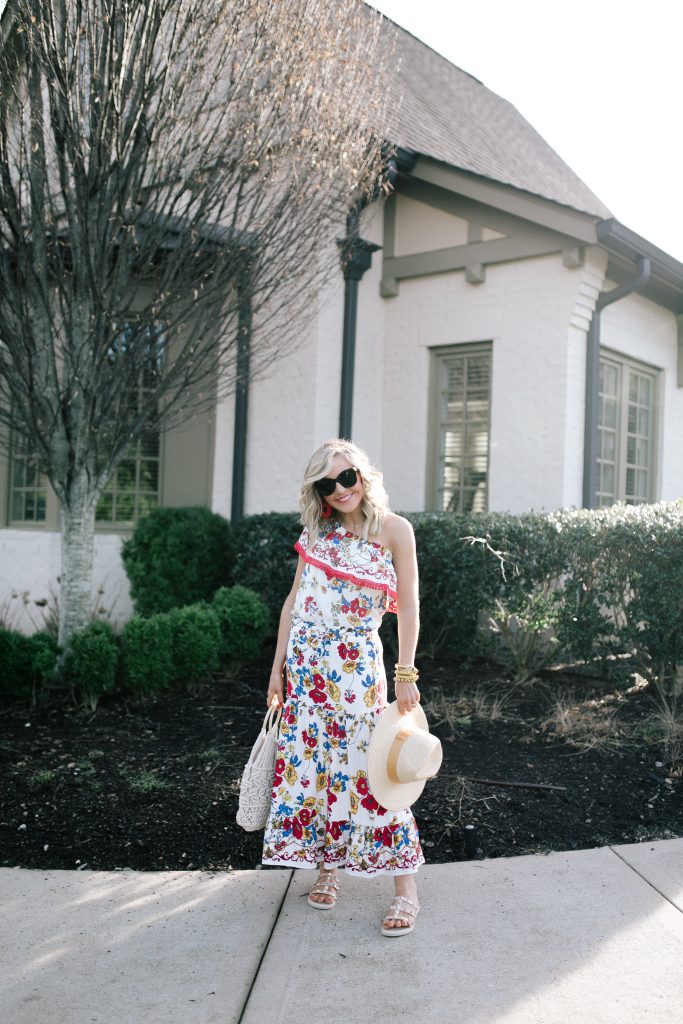 Let's Getaway... The Gibson Resort x Hi Sugarplum Collection is Here! by popular Nashville fashion blog, Hello Happiness: image of a woman wearing a Hi Sugarplum Portofino Tiered Midi Skirt, Amazon Aphoraeny Womens Rivets Flat Sandals, Amazon boderier Beaded Drop Earrings, and ShopBop Hat Attack Cotton Cord Bag.