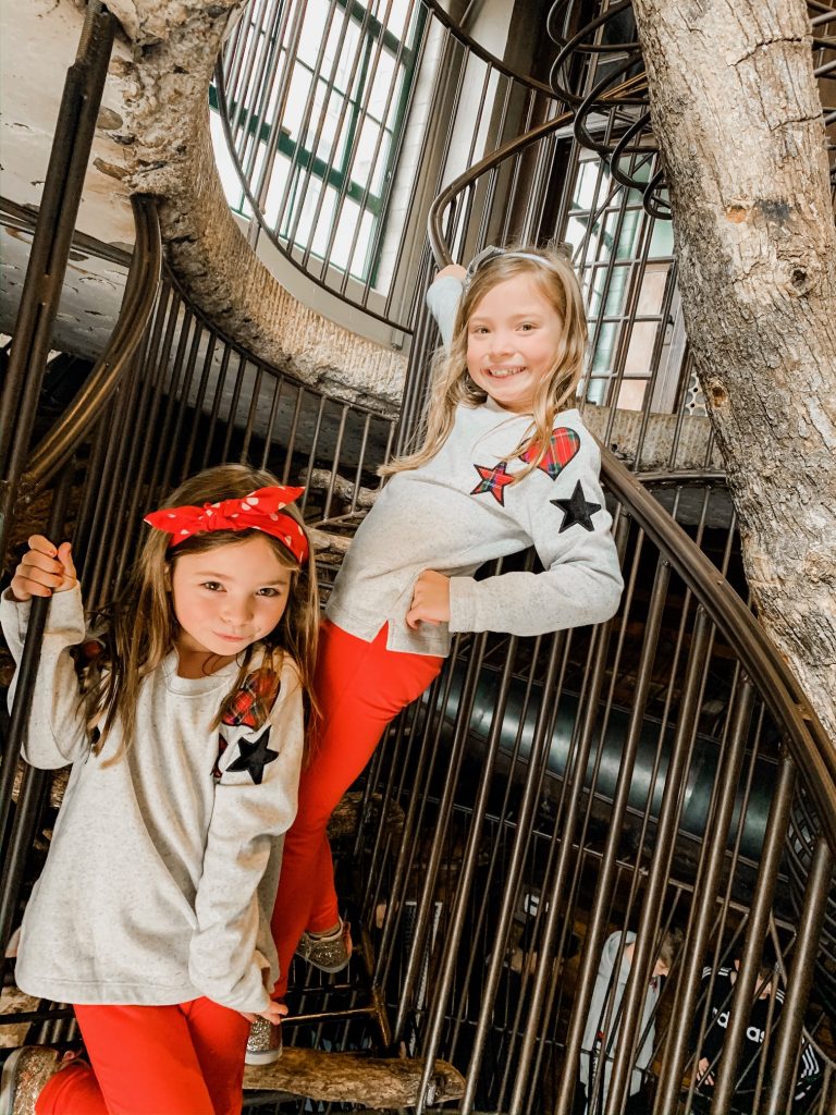 Meet Me for a Weekend in St. Louis | The Perfect Family Getaway by popular travel blog, Hello Happiness: image of two girls inside the City Museum. 