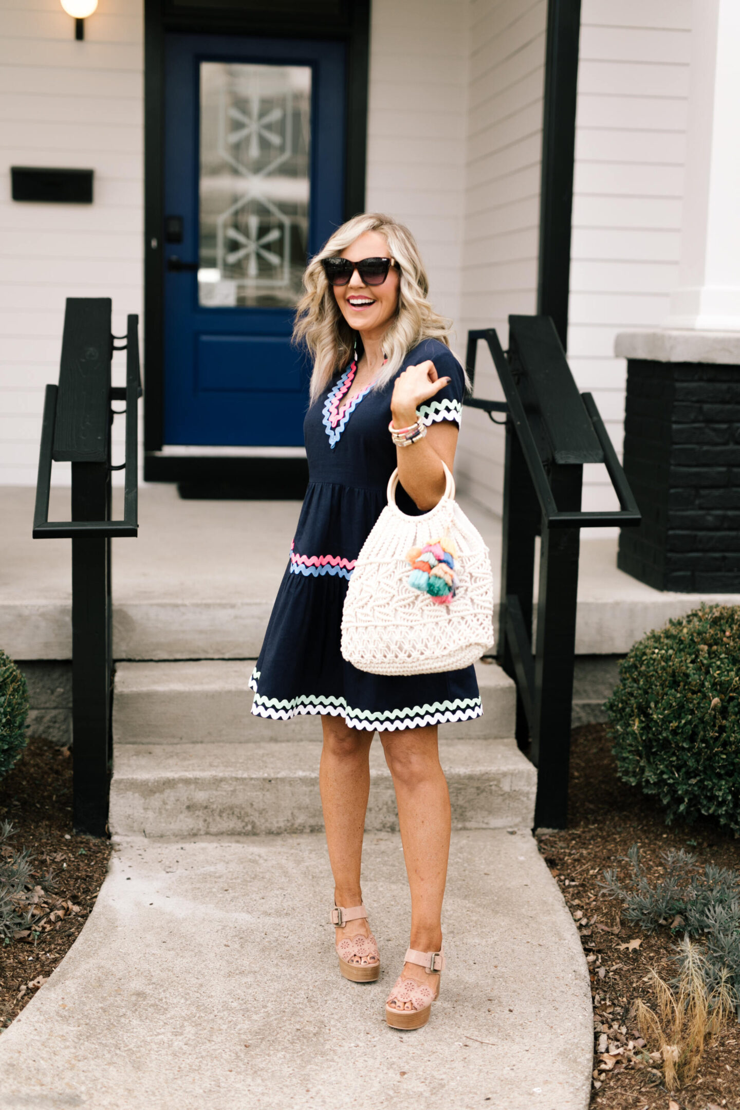 Sail to Sable by popular Nashville fashion blog, Hello Happiness: collage image of Natasha Stoneking wearing a Sail to Sable Ric Rac dress, Quay sunglasses and carrying a cotton cord bag with a tassel charm. 