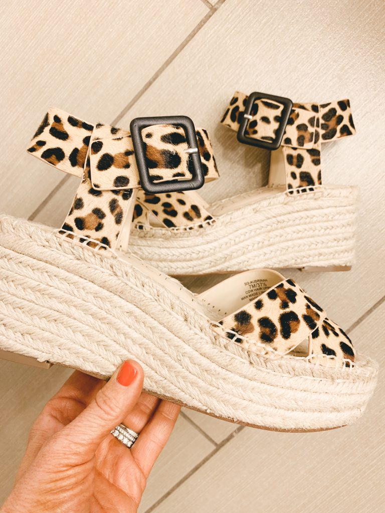 Leopard Print favorites featured by top US fashion blog, Hello Happiness: image of a woman wearing leopard  print espadrille sandals