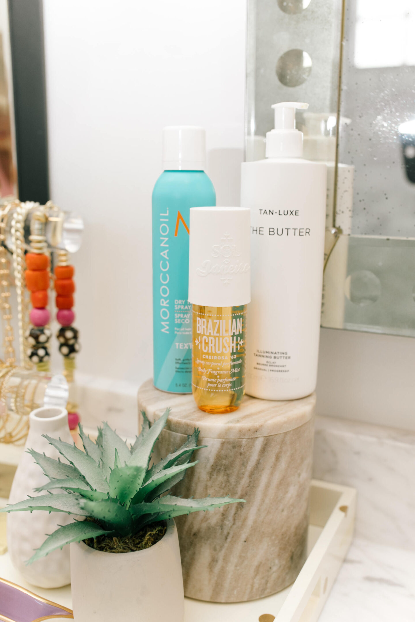 Sephora Beauty by popular Nashville beauty blog, Hello Happiness: image of Brazilian Crush, Tan-Luxe The butter, and Moroccan oil.