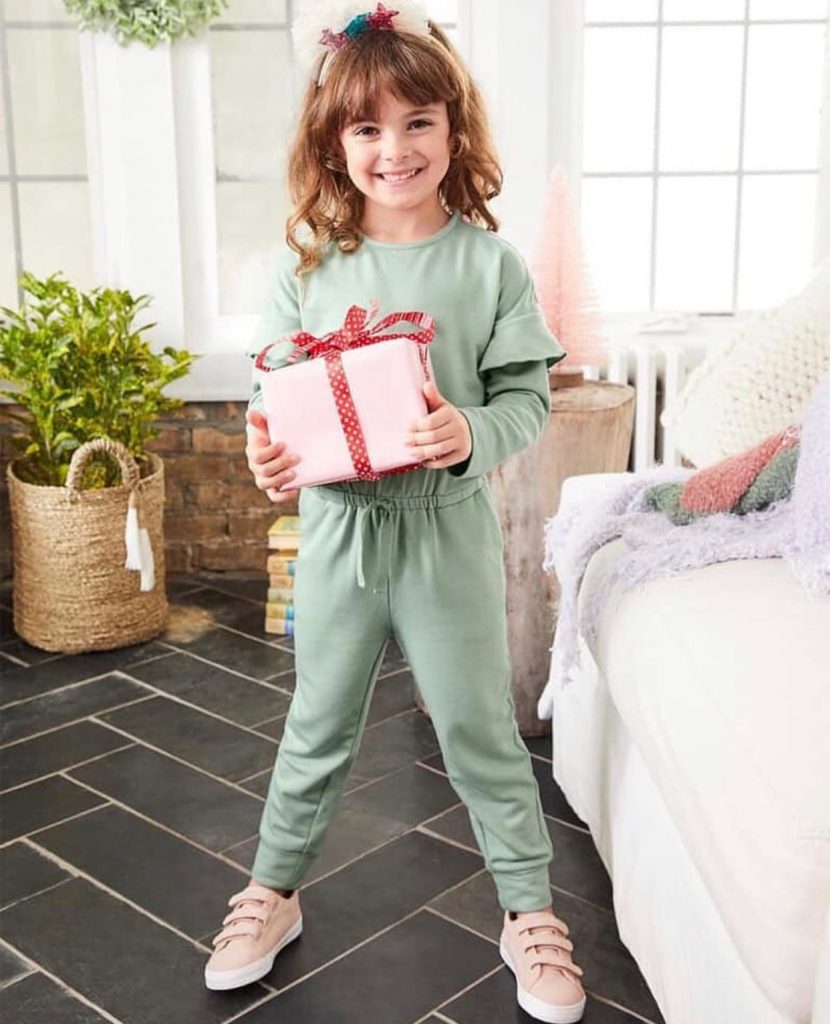 Shop Small Saturday 2019 by popular Nashville life and style blog, Hello Happiness: image of a girl wearing a Matilda Jane jumper.