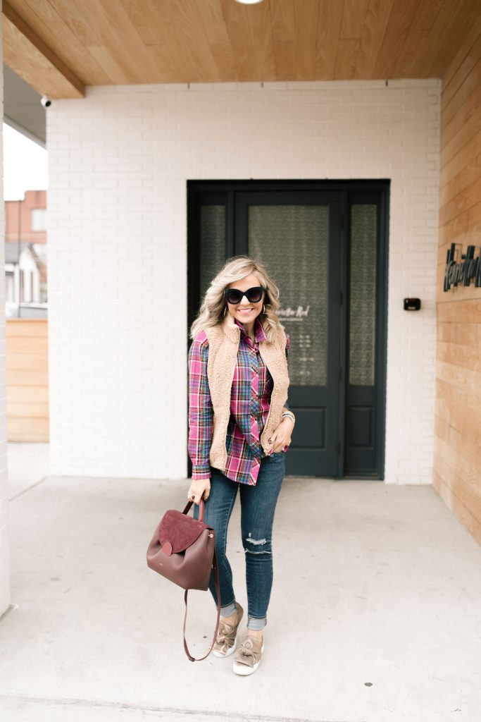 Staple Everyday Style + New Favs | We Dress America by popular Nashville fashion blog, Hello Happiness: image of a woman wear a Walmart Time and Tru Women's Woven Plaid Shirt, Walmart Signature by Levi Strauss & Co. Women's Modern Slim Cuffed Jean, Walmart J/Slides - Audra - Taupe Metallic Leather, Walmart Quay Australia "It's My Way" Cat Eye Sunglasses, and Walmart fleece vest.