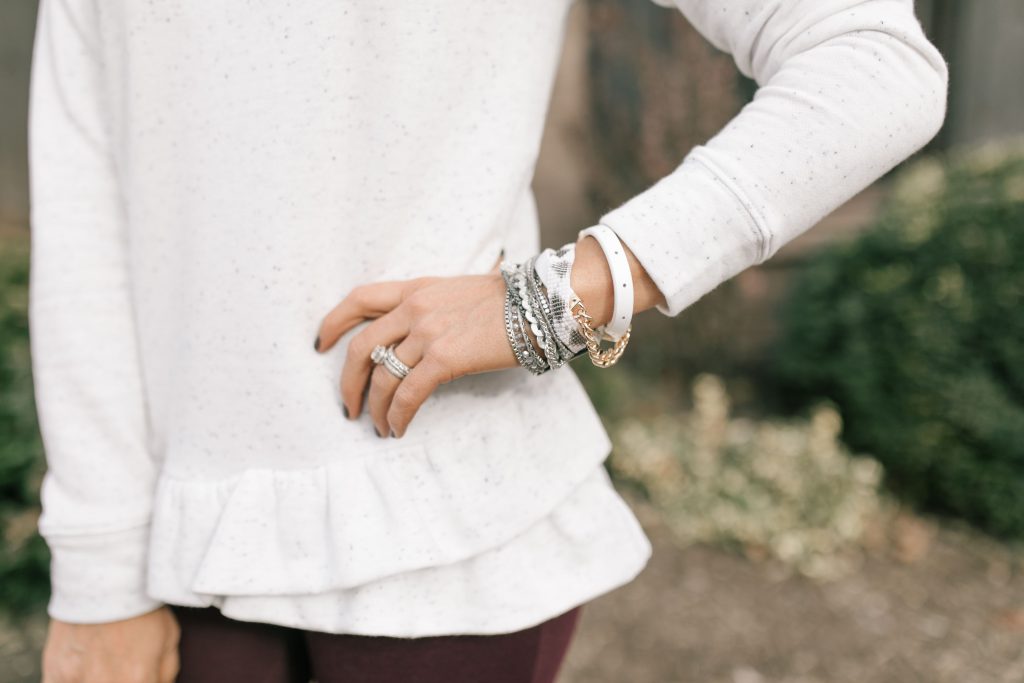  The 12 Days of YAY from Loft... $25 Sweatshirts + Fleece by popular Nashville fashion blog, Hello Happiness: image of a woman outside wearing a Loft FUNNEL NECK SWEATSHIRT and Loft HIGH WAIST LEGGINGS IN SEAMED PONTE.