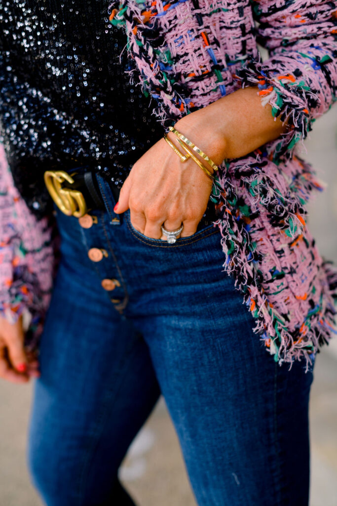 Accessory Concierge by popular Nashville fashion blog, Hello Happiness: image of Natasha Stoneking wearing the Accessory Concierge Deco Gem Drop Earrings, black sparkle top, Check Tweed Jacket + Sequin Cami Top