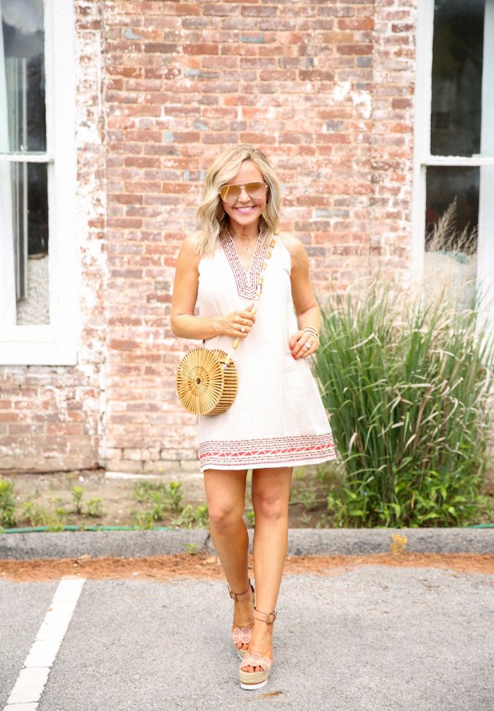 Summer Capsule Wardrobe featured by top US fashion blog Hello! Happiness; Image of a woman wearing Social Threads halter dress.