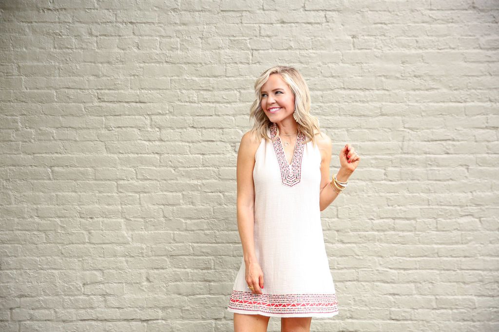 Summer Capsule Wardrobe featured by top US fashion blog Hello! Happiness; Image of a woman wearing Social Threads halter dress.