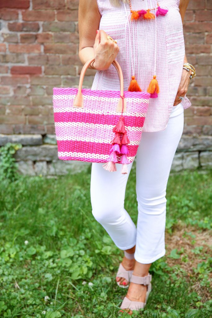 Summer Capsule Wardrobe featured by top US fashion blog Hello! Happiness; Image of a woman wearing Social Threads embroidered blouse, Blank NYC flare jeans and Sole Society wedges.