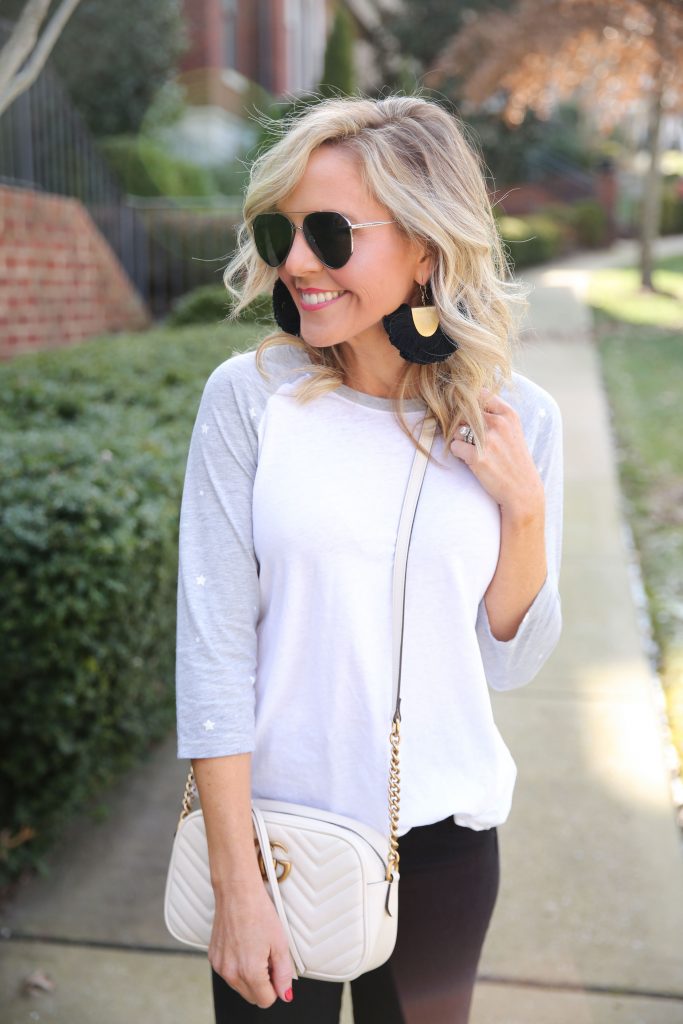 Leopard Print favorites featured by top US fashion blog, Hello Happiness: image of a woman wearing leopard  print sneakers