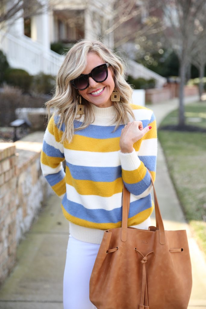 Best Small Shops featured by top US life and style blog Hello! Happiness; Image of a woman wearing a Gunny Sack and Co striped sweater, Vince Camuto booties and white skinny jeans.