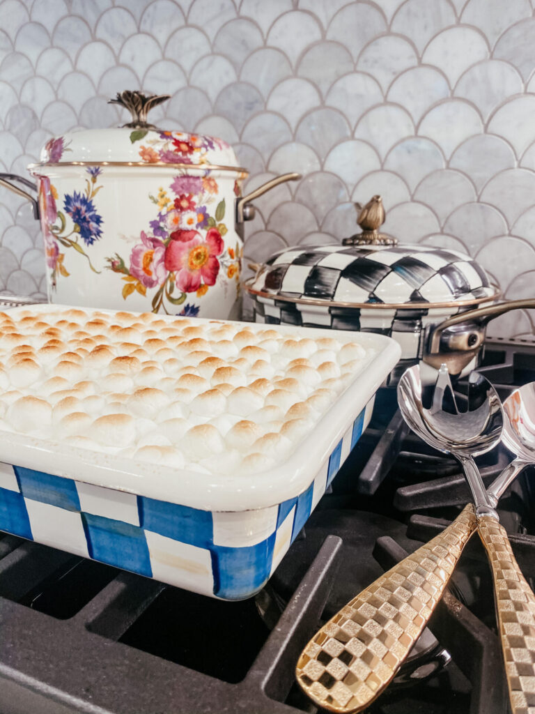 Sweet Potato Casserole Recipe by popular Nashville lifestyle blog, Hello Happiness: image of Sweet Potato Casserole in a Mackenzie Child baking dish. 